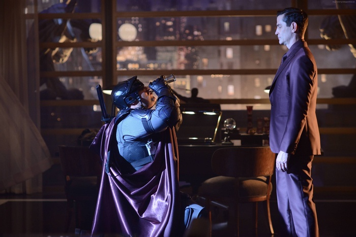 Oswald Cobblepot and a character in armor from Gotham