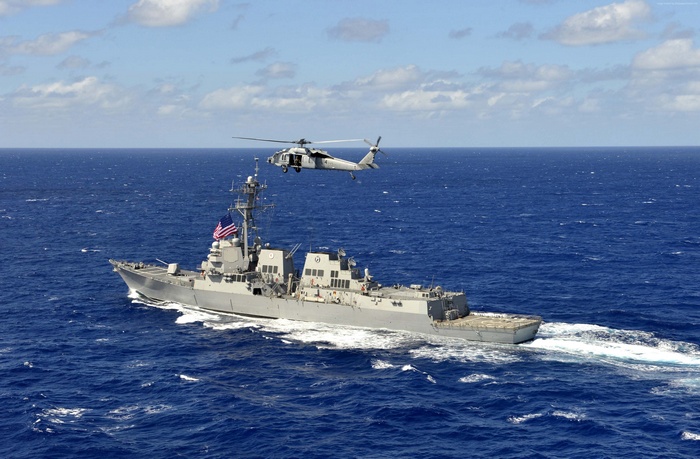 USS William P. Lawrence and helicopter at sea