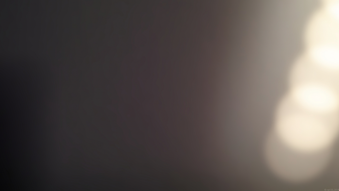 Abstract light flares on dark background