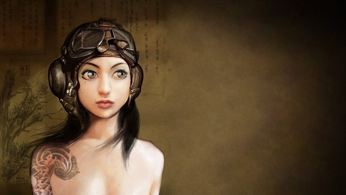 Woman with goggles and tattoo