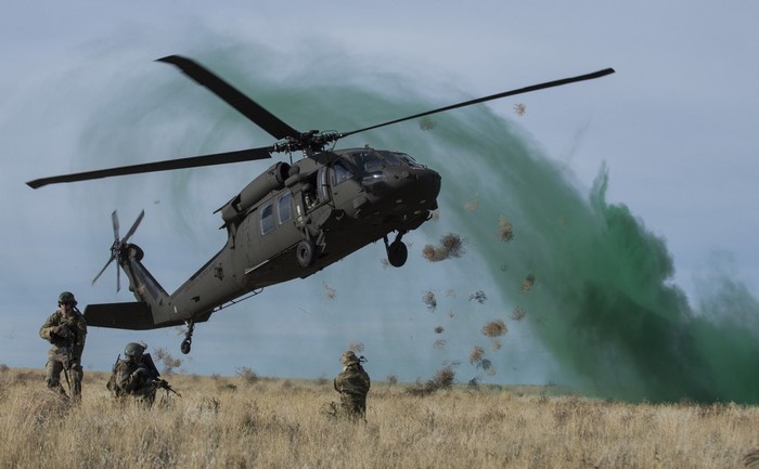 US Army Black Hawk helicopter and soldiers in training