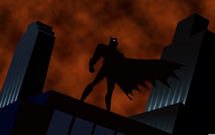 Batman silhouette on a rooftop