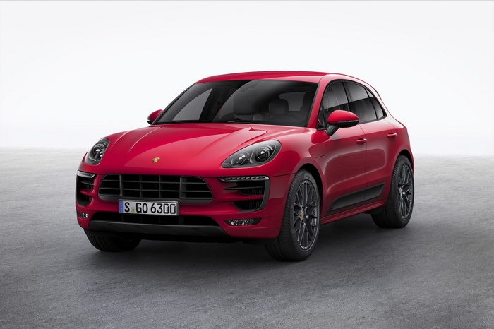 Red Porsche Macan GTS on a concrete surface