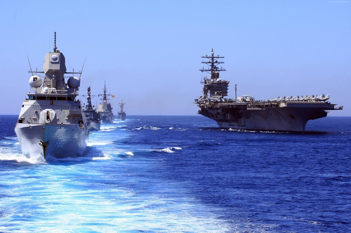 US Navy Aircraft Carrier and Frigates Sailing