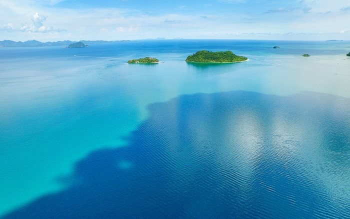 Turquoise sea with islands and blue sky