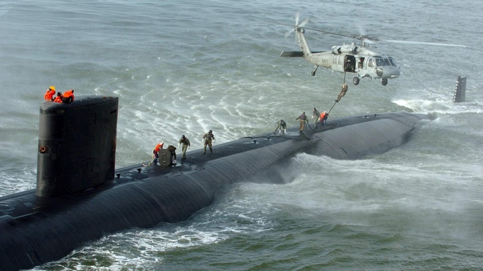 US Navy submarine USS Toledo SSN-769 with helicopter