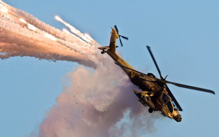 AH-64 Apache helicopter firing flares