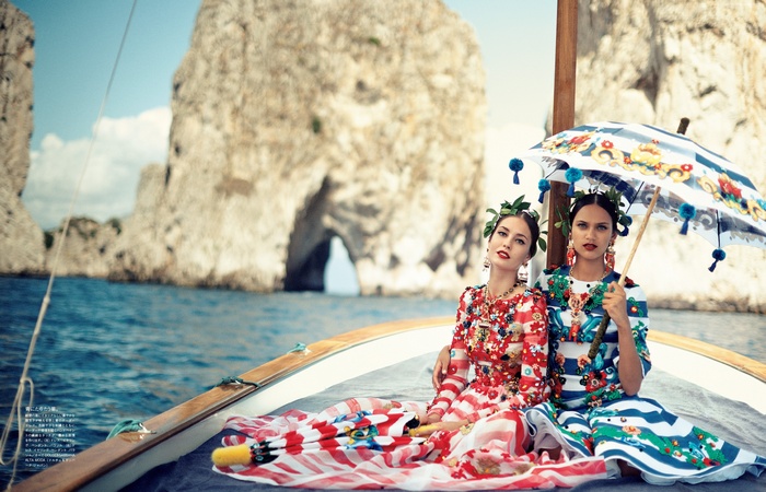 Models Kinga Rajzak and Nadja Bender on a boat in Capri