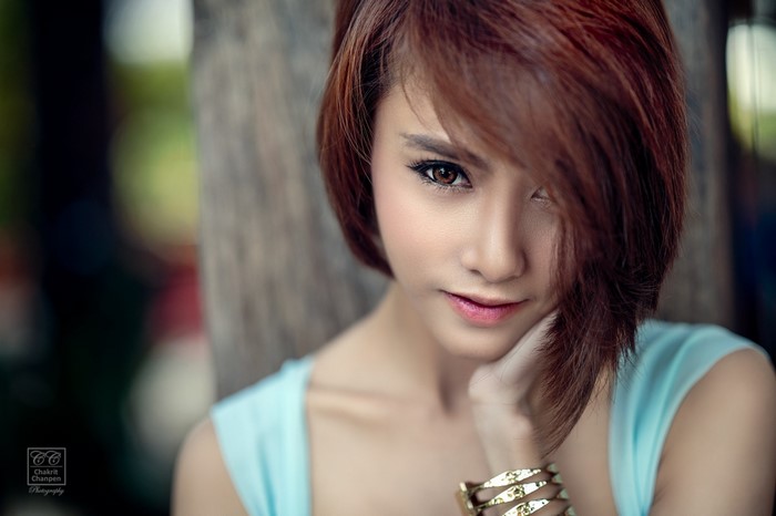 Portrait of a Woman with Red Hair and Soft Smile
