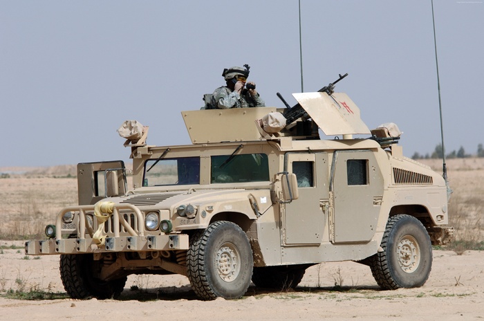 U.S. Army Humvee with soldier and machine gun
