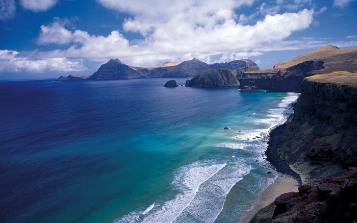 Coastal Cliffs and Turquoise Bay in Chile