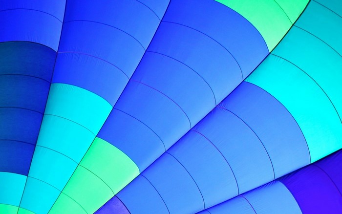 Abstract pattern of blue and green hot air balloon fabric