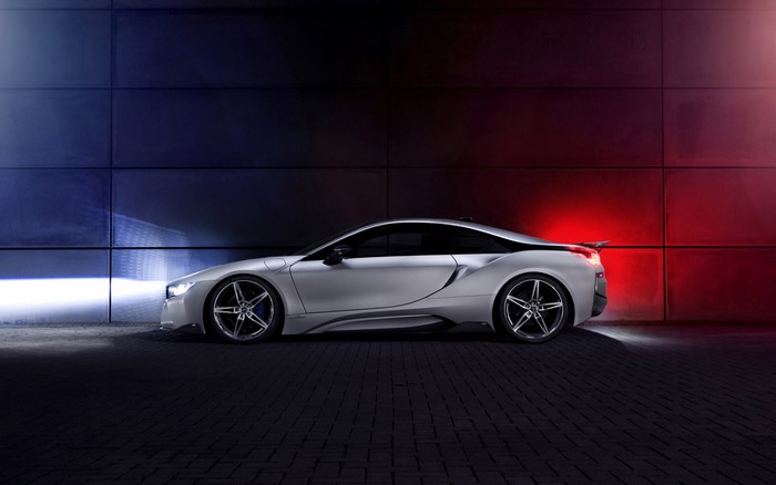 Silver BMW i8 sports car with blue and red lighting
