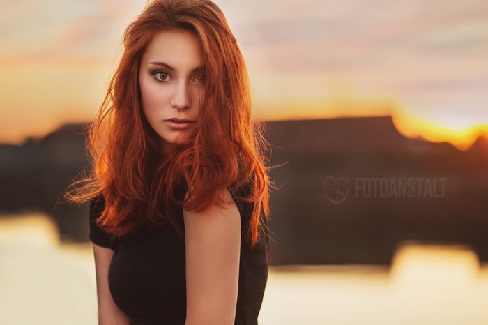 Redhead Woman with Long Hair at Sunset