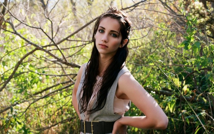Woman with wet hair in a forest