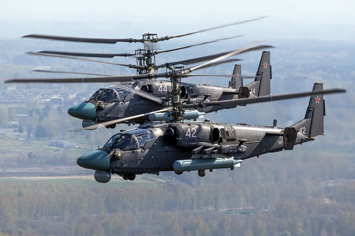 Two Kamov Ka-52 Alligator helicopters in flight