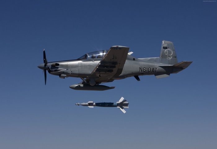 Beechcraft AT-6 Texan II dropping a bomb