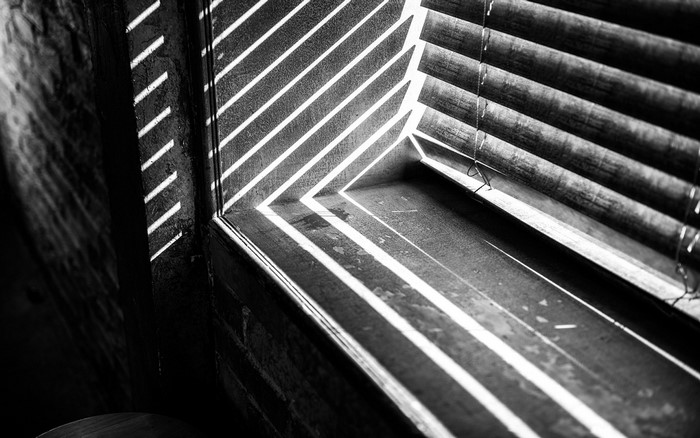 Sunlight stripes on a window sill