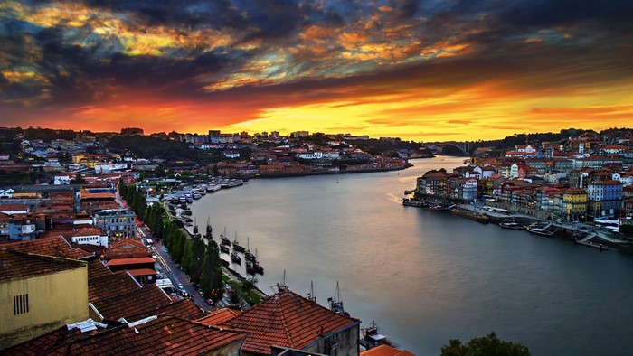 Porto cityscape at sunset over the Douro River, Portugal