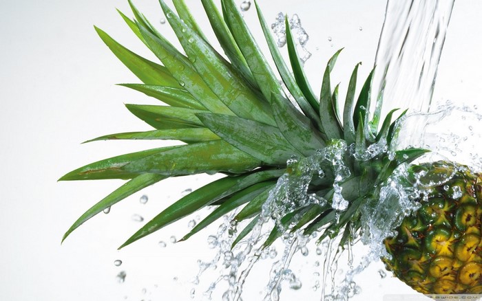 Pineapple with water splashes