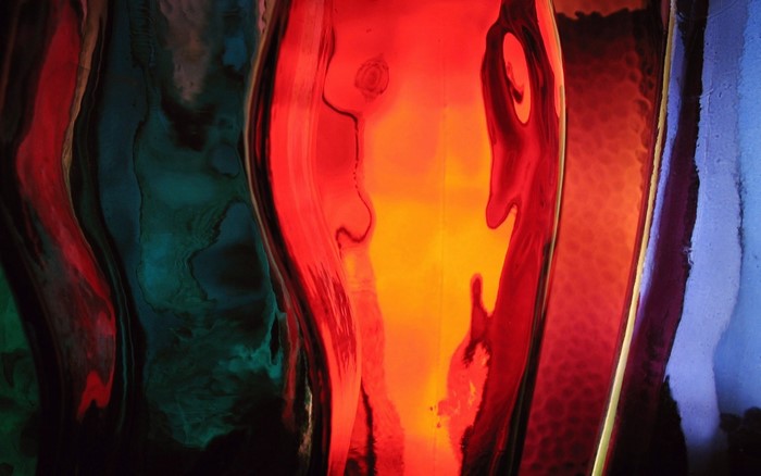 Abstract colorful glass with red and blue reflections