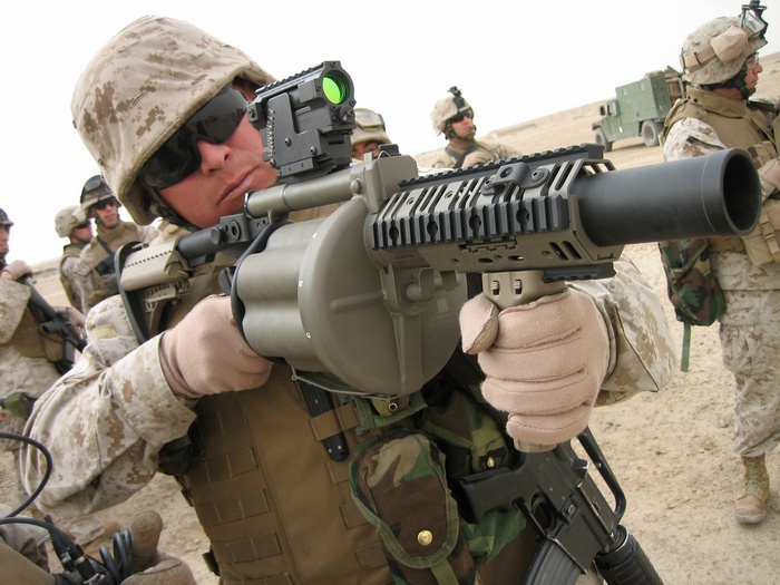 Soldier with Milkor SuperSix MRGL grenade launcher