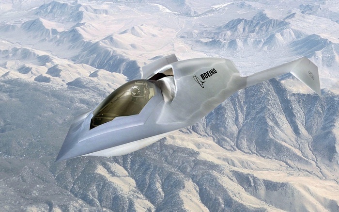 Boeing Bird of Prey stealth aircraft flying over mountains