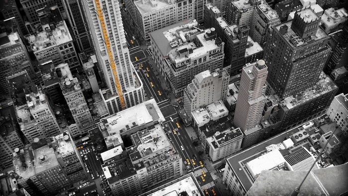 Aerial view of New York City skyscrapers with selective coloring