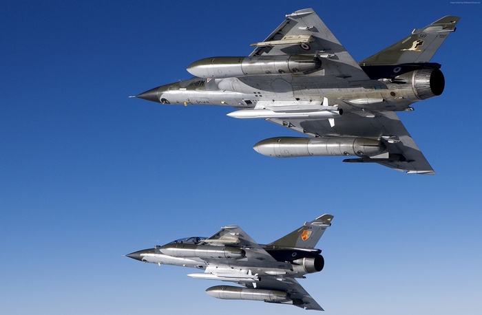 Two French Air Force Mirage 2000 fighter jets in flight