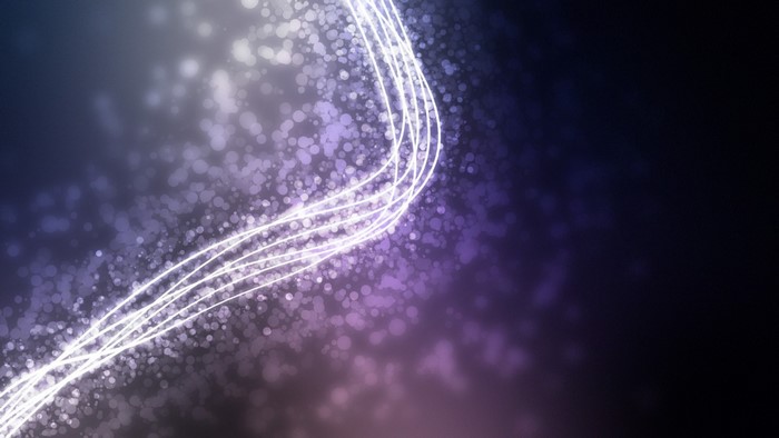 Abstract light waves and particles on a dark background