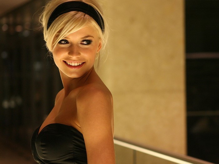 Lena Gercke wearing a black strapless dress