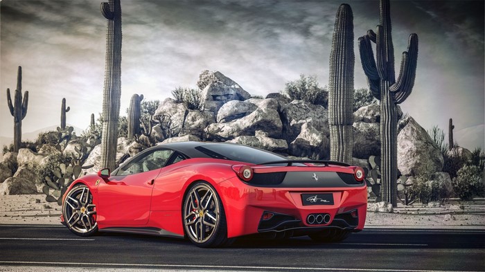 Red Ferrari 458 Italia in a desert landscape