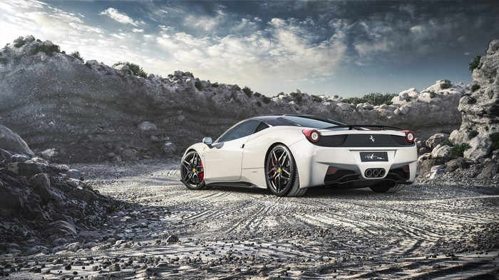 White Ferrari 458 Italia on a rocky terrain
