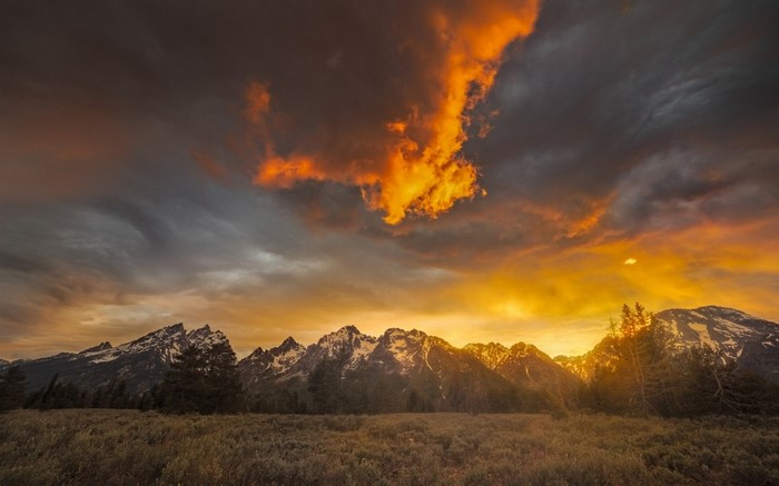 Sunset over Grand Teton National Park mountains