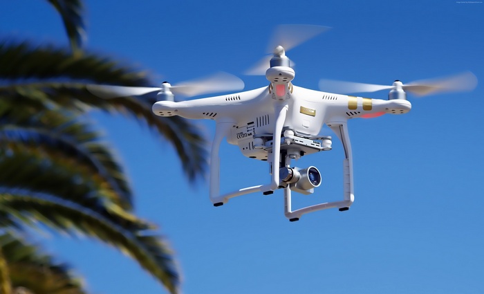 DJI Phantom 3 quadcopter drone flying
