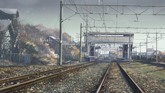 Train station with tracks and overhead wires