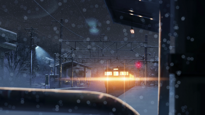 Train station at night with snow and lights
