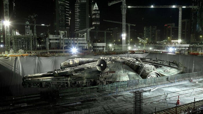 Millennium Falcon at a construction site at night