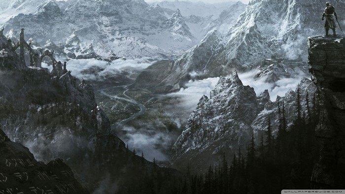 The Elder Scrolls V Skyrim: A lone warrior surveys a snowy mountain valley