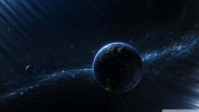 Planet and moon in outer space with nebula