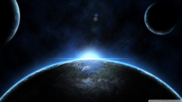 Sunrise over Earth with two moons in space