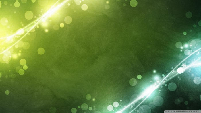 Green and yellow abstract light circles and waves