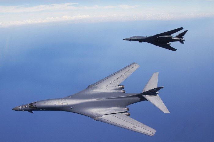 Two Rockwell B-1 Lancer bombers flying in formation