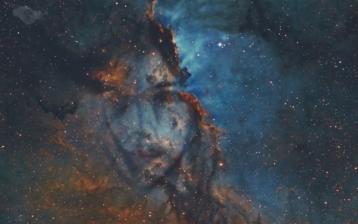Cosmic nebula with stars and gas clouds