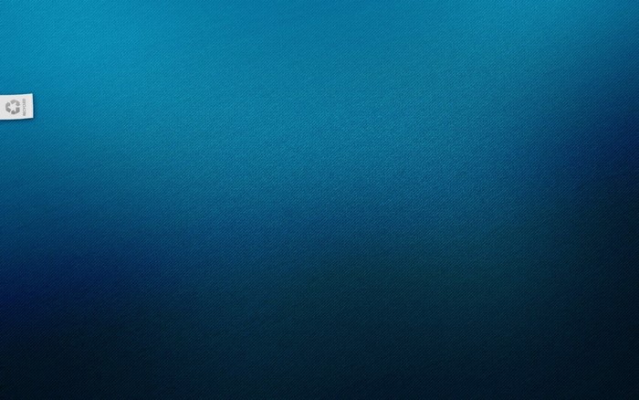 Recycle symbol on blue fabric texture