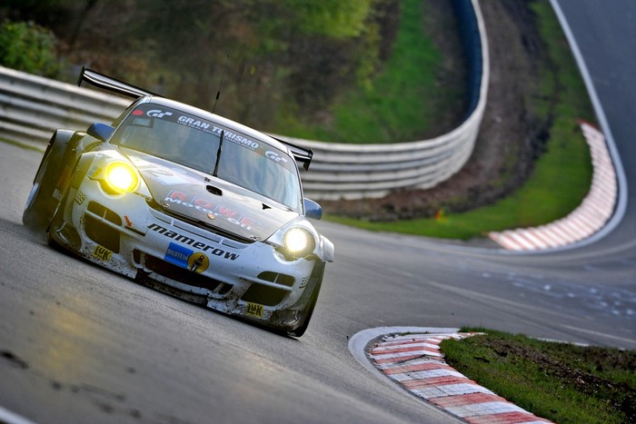Porsche 911 GT3 race car on a track