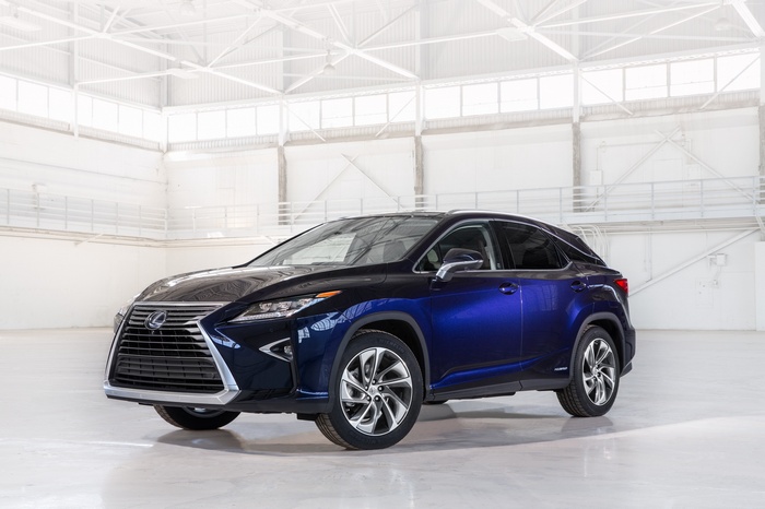 Dark Blue Lexus RX 450h F Sport in a Studio