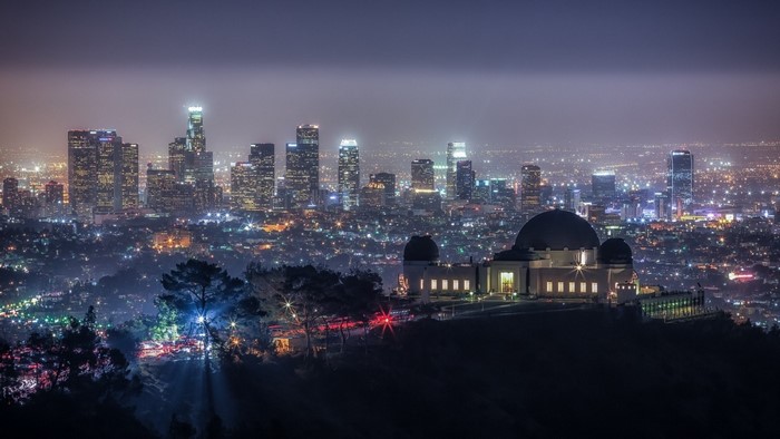 Griffith Observatory overlooking Los Angeles skyline at night