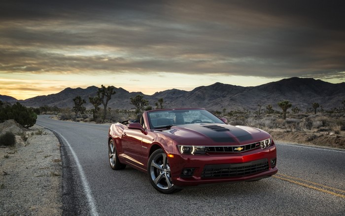 Red Chevrolet Camaro Convertible on Desert Road