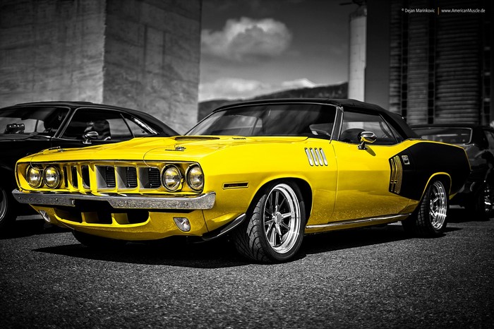Yellow and black Plymouth Barracuda convertible